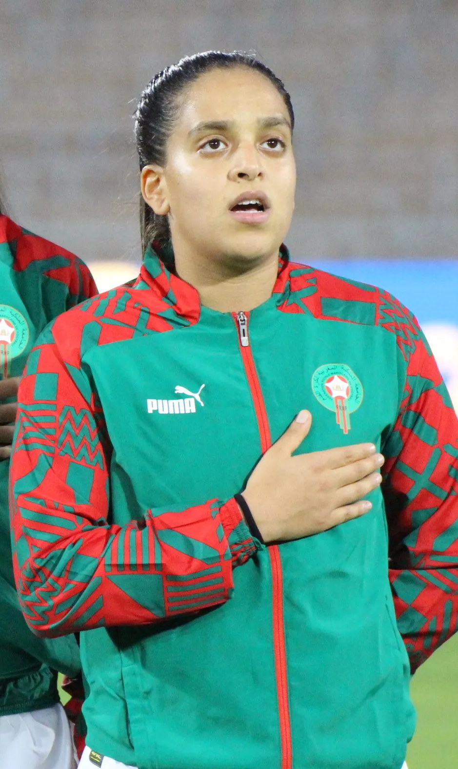 Sakina Ouzraoui lors d’un match de la sélection féminine marocaine, contexte sportif national.