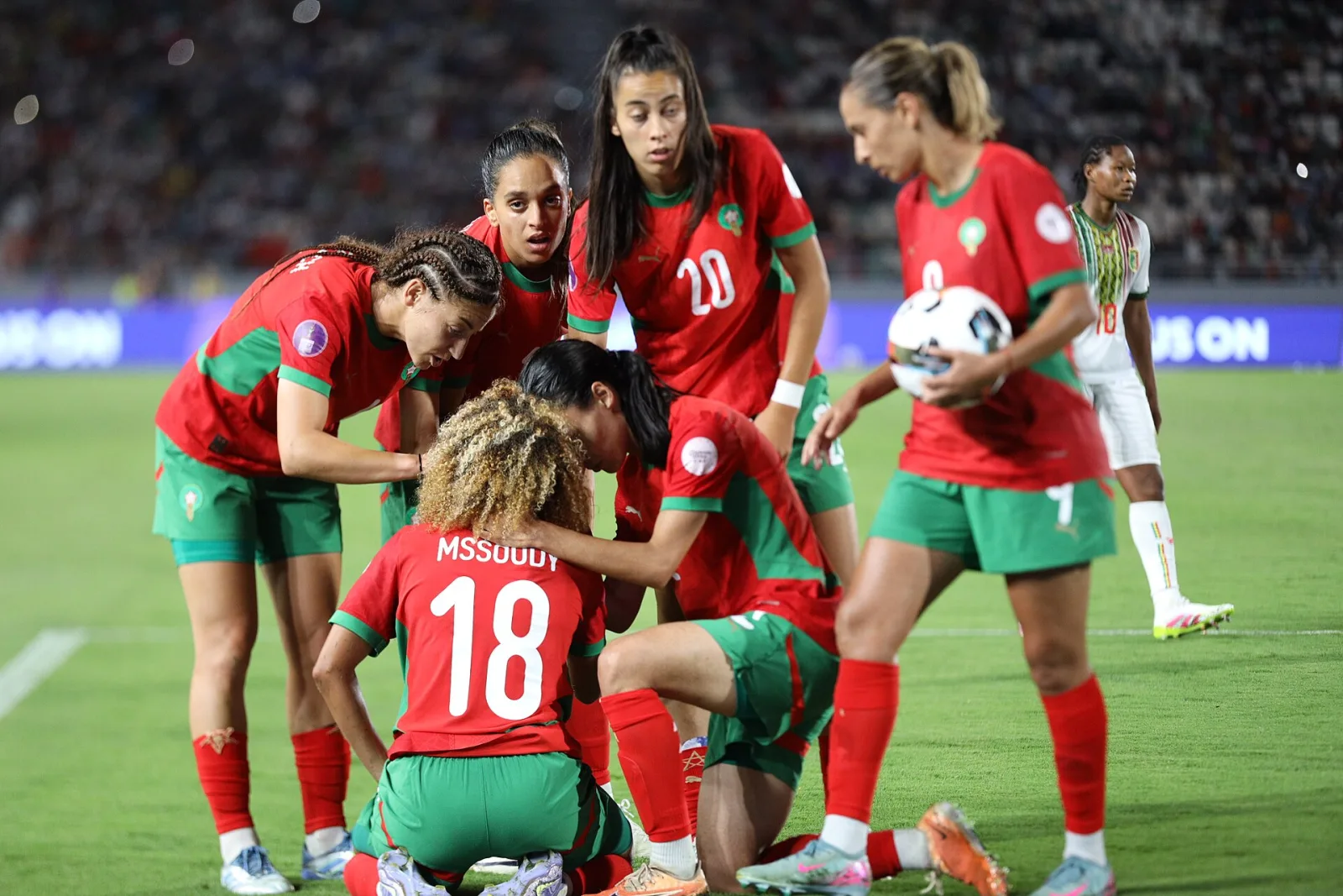 Joueuses de l’équipe nationale féminine du Maroc pendant une compétition africaine, contexte des Lionnes de l’Atlas.