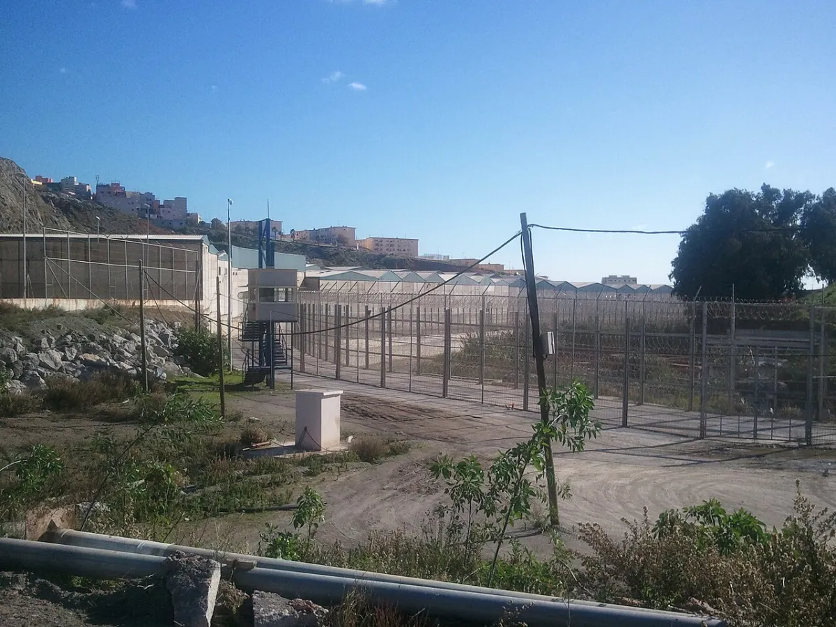 Another view of the Ceuta/Sebta border fence, context for controls and flows.